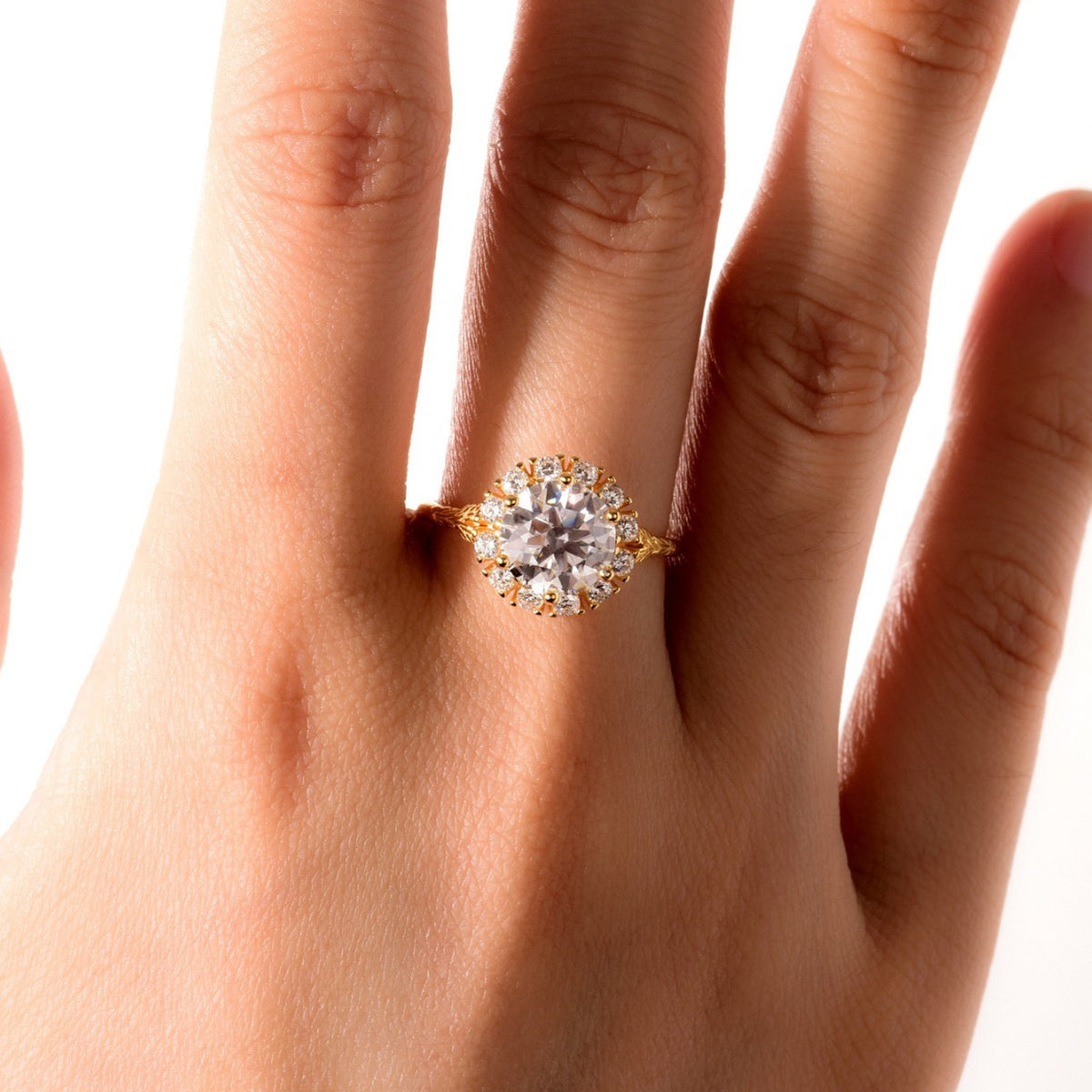 The Soleil Halo Moissanite Ring
