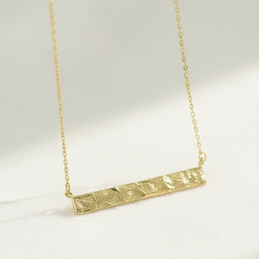 Hammered gold tag bar necklace