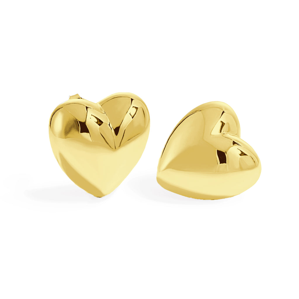 Gold heart-shaped earrings on a white background